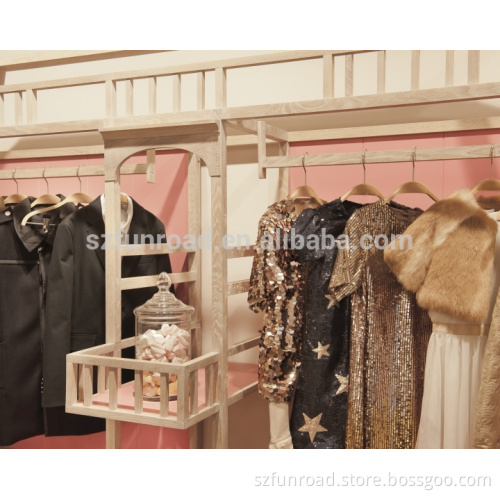 Unique boat shape displays for kid shoes and clothes and bespoke cash counter for kids stores